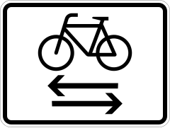 Cyclists crossing from both directions