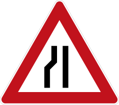 Road narrows on left