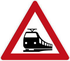 Railway crossing with barriers