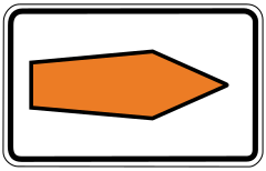 White direction sign with arrow